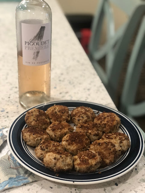 Crab Cakes made with Super Team Protein Bars and served with wine